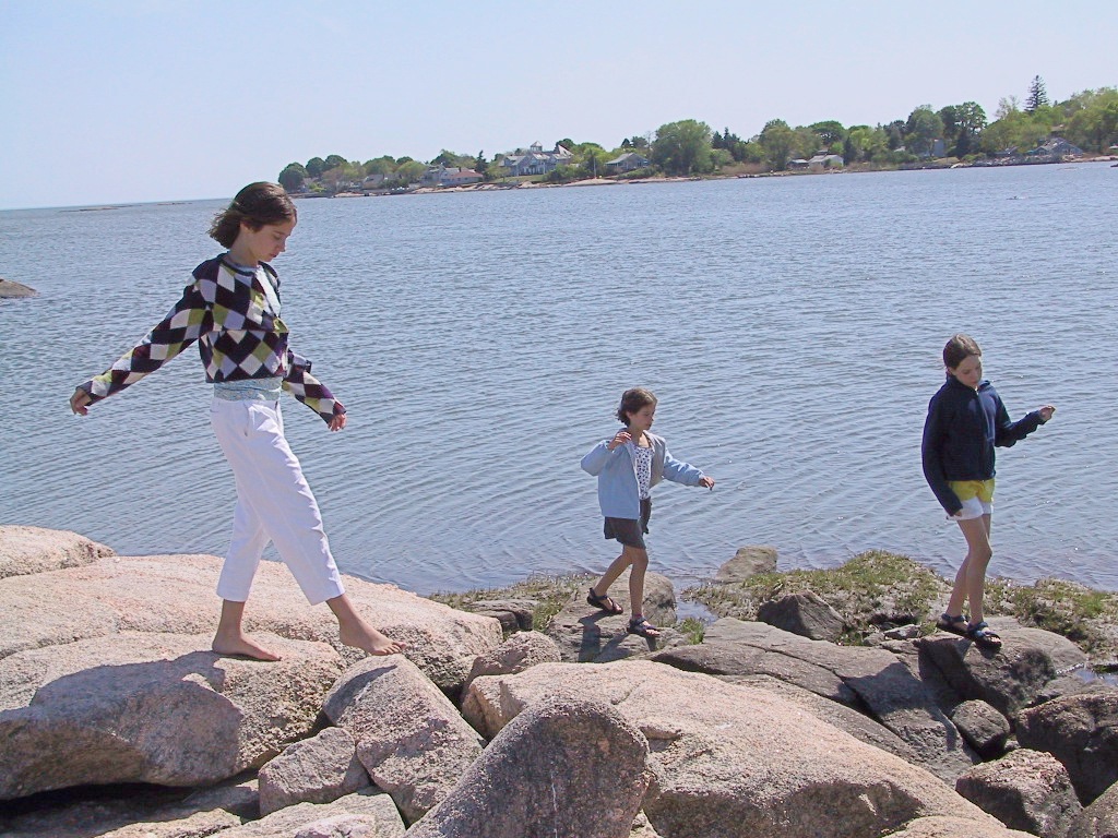 Walkers on the rocky coast